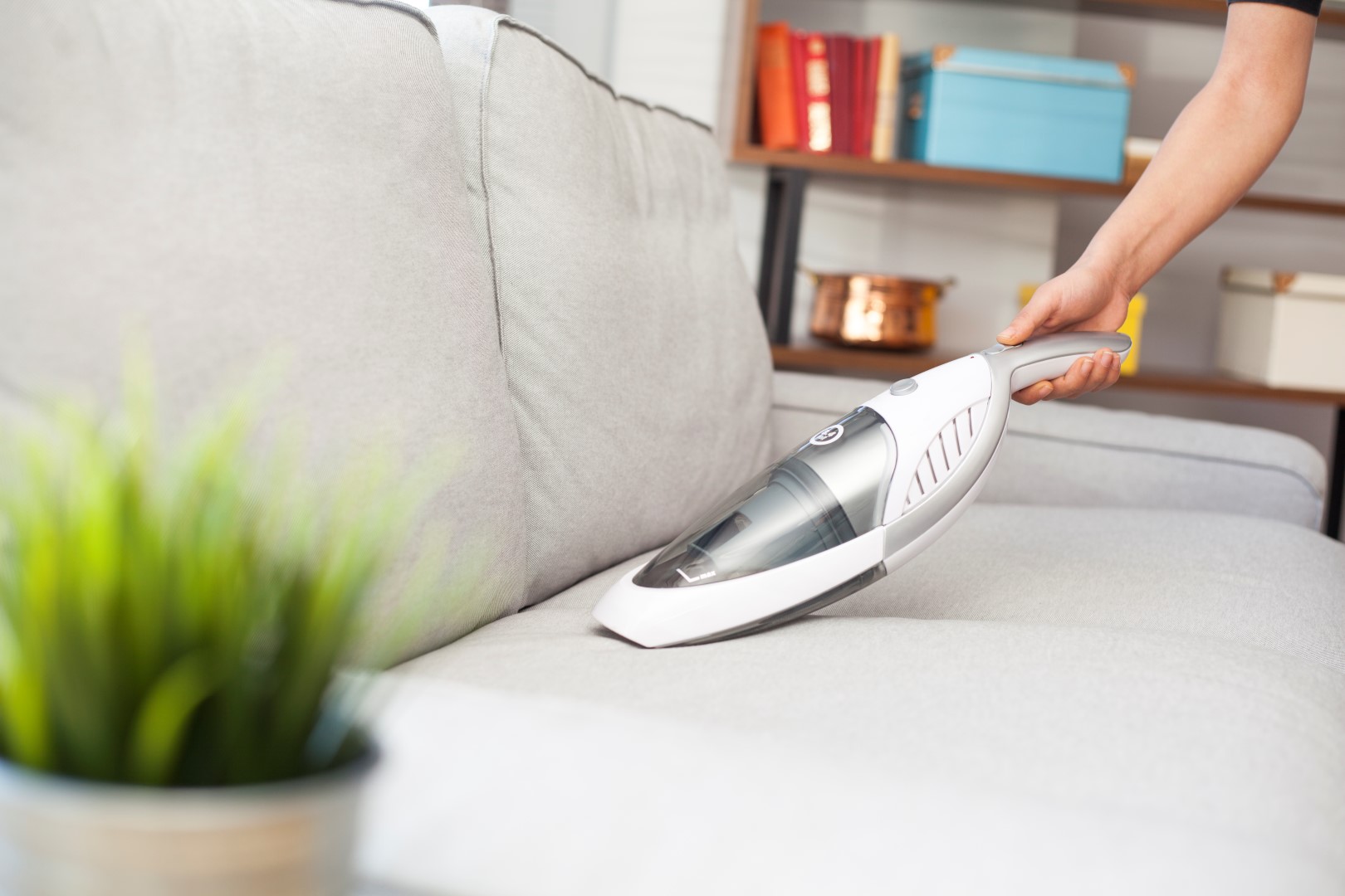 Photograph vacuuming to remove all traces of dust between the fibers of the upholstery